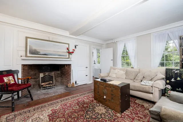 a living room with furniture or couch and a window