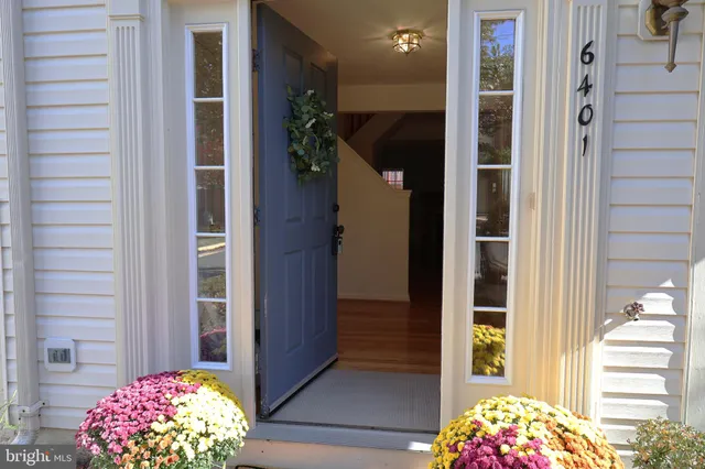 a view of a wooden door and a outdoor space