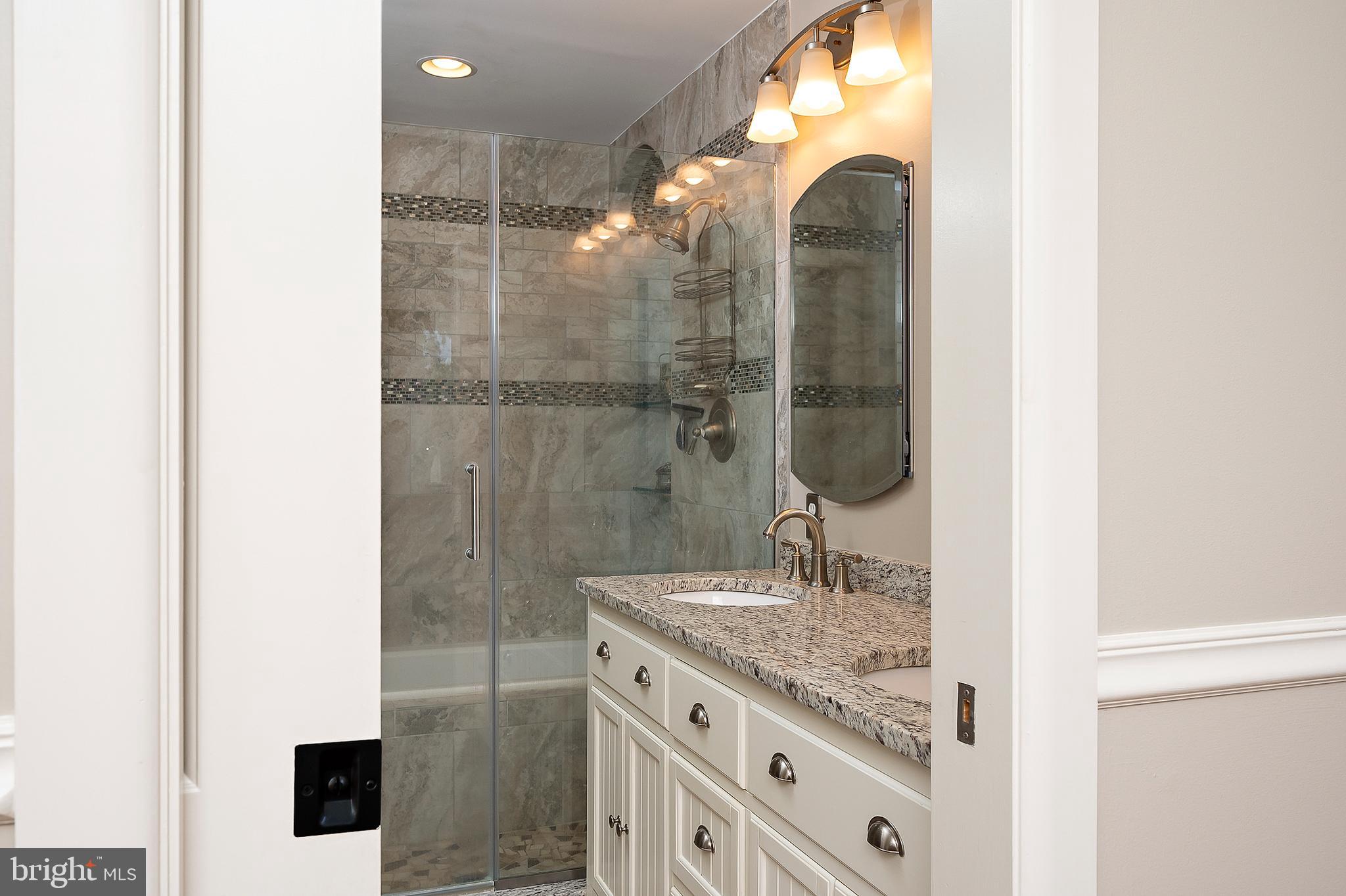 5289 Kerger Road Ellicott City, MD 21043 - Photo 26 of 51 Pocket Doors to Primary Bath