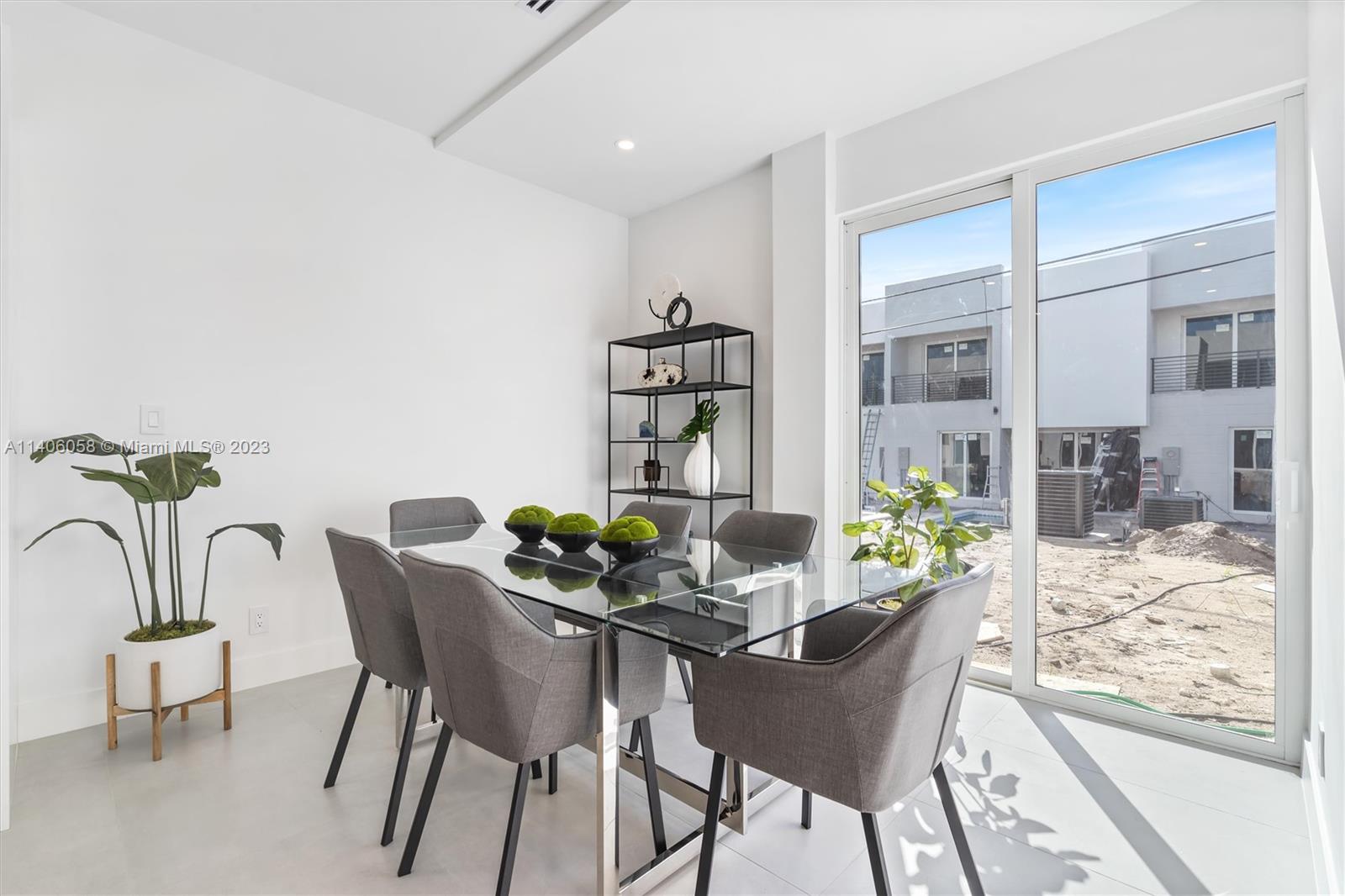 2290 Southeast 6th Street Pompano Beach, FL 33062 - Photo 6 of 22 a dining room with furniture and window