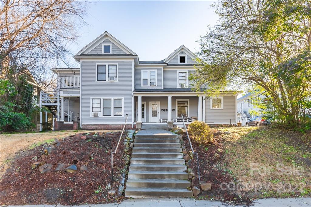 315 State Street Greensboro, NC 27403 - Photo 1 of 21 a front view of a house with a yard