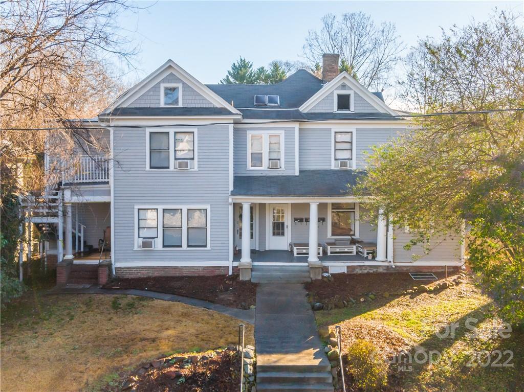 315 State Street Greensboro, NC 27403 - Photo 12 of 21 a front view of a house with a yard