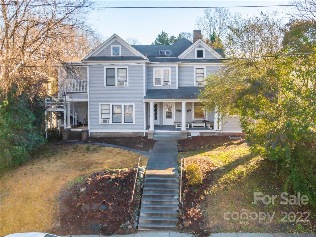 315 State Street Greensboro, NC 27403 - Photo 13 of 21 a front view of a house with swimming pool