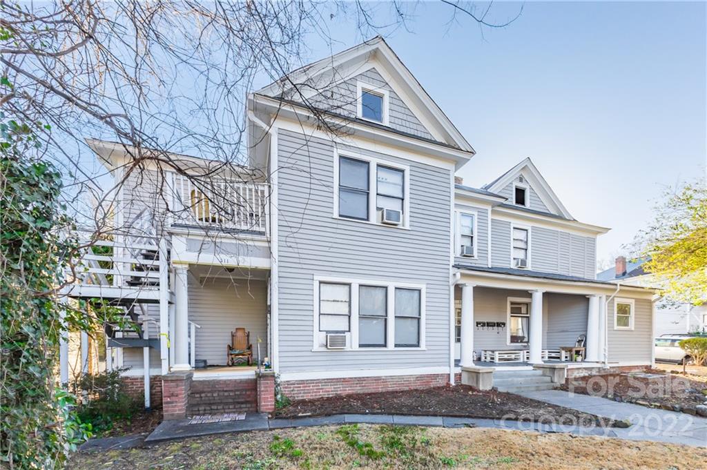 315 State Street Greensboro, NC 27403 - Photo 2 of 21 a front view of a house with garden