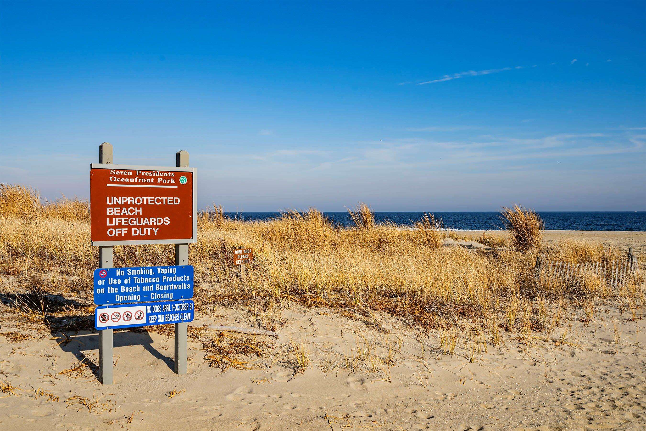 136 Sampson Place Long Branch, NJ 07740 - Photo 17 of 18 a view of a sign board with an ocean
