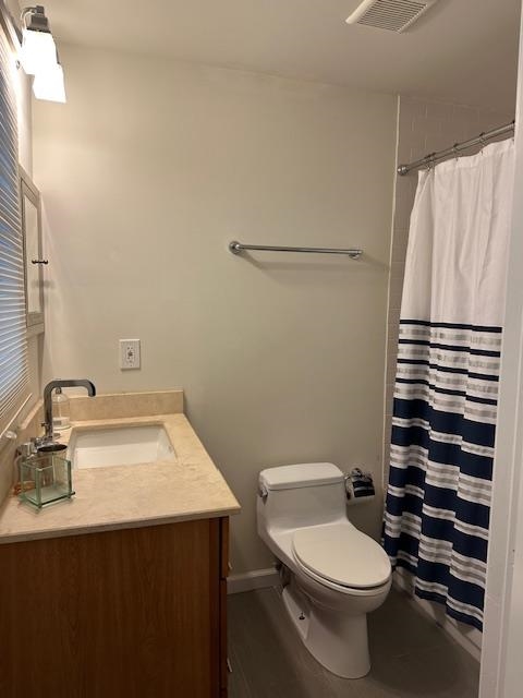 136 Sampson Place Long Branch, NJ 07740 - Photo 6 of 18 a bathroom with a sink a toilet and shower