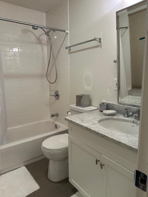 136 Sampson Place Long Branch, NJ 07740 - Photo 8 of 18 a bathroom with a granite countertop sink a toilet and shower