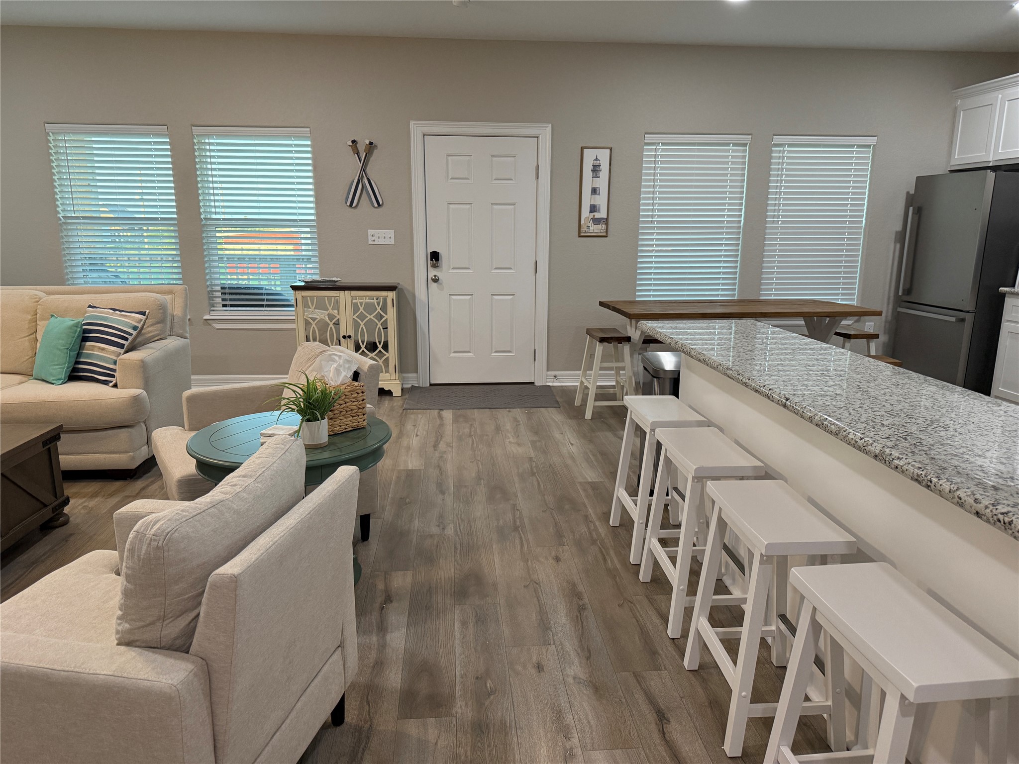528 Thunder Road Surfside Beach, TX 77541 - Photo 22 of 22 a living room with furniture and a flat screen tv
