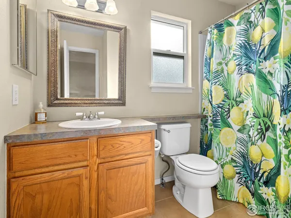 a livingroom with a book shelf