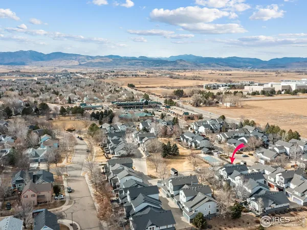 a view of a city with mountains in the background