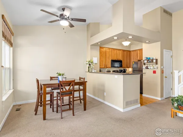 a aerial view of a house with a yard