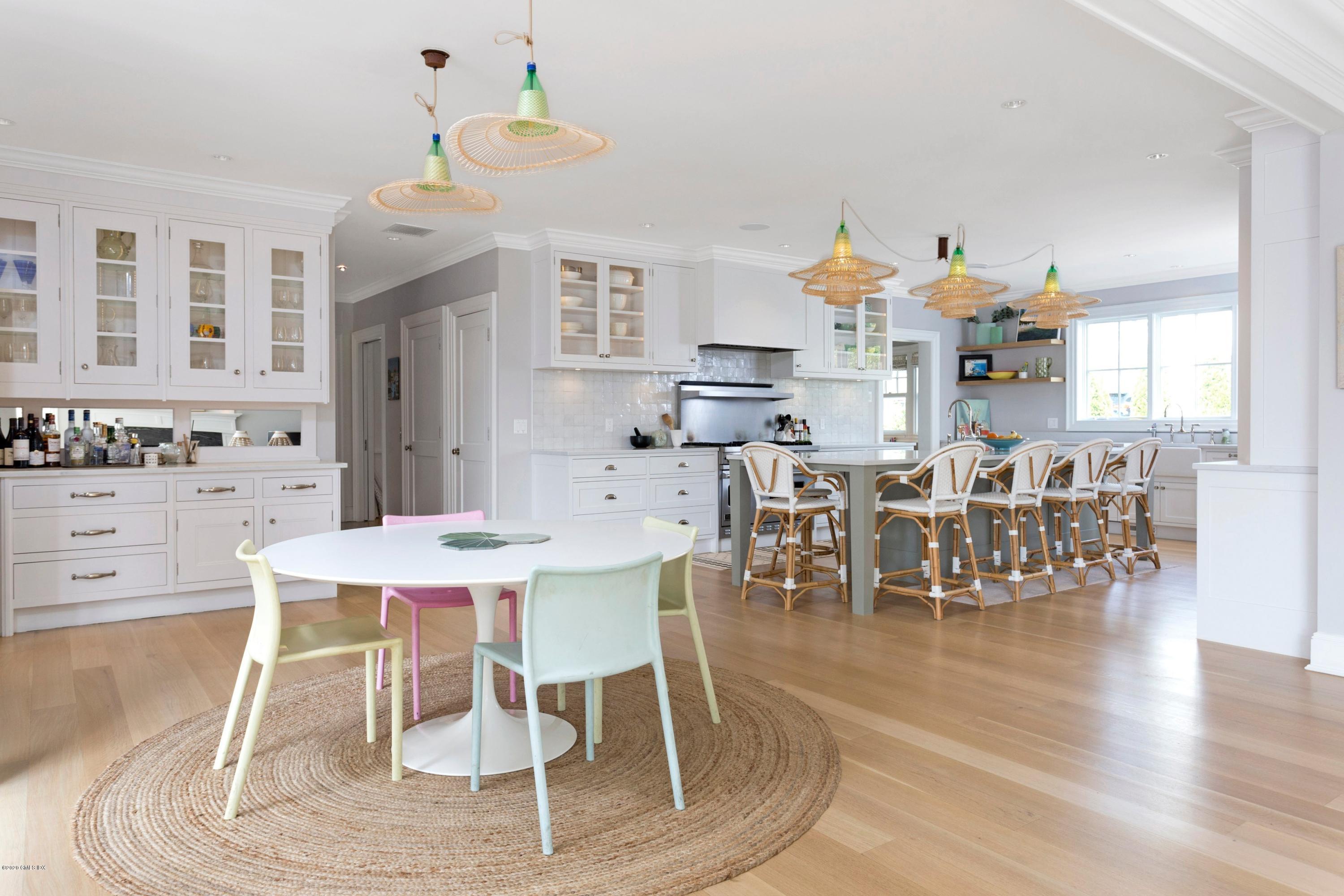 186 Shore Road Old Greenwich, CT 06870 - Photo 12 of 37 a view of a dining room with furniture