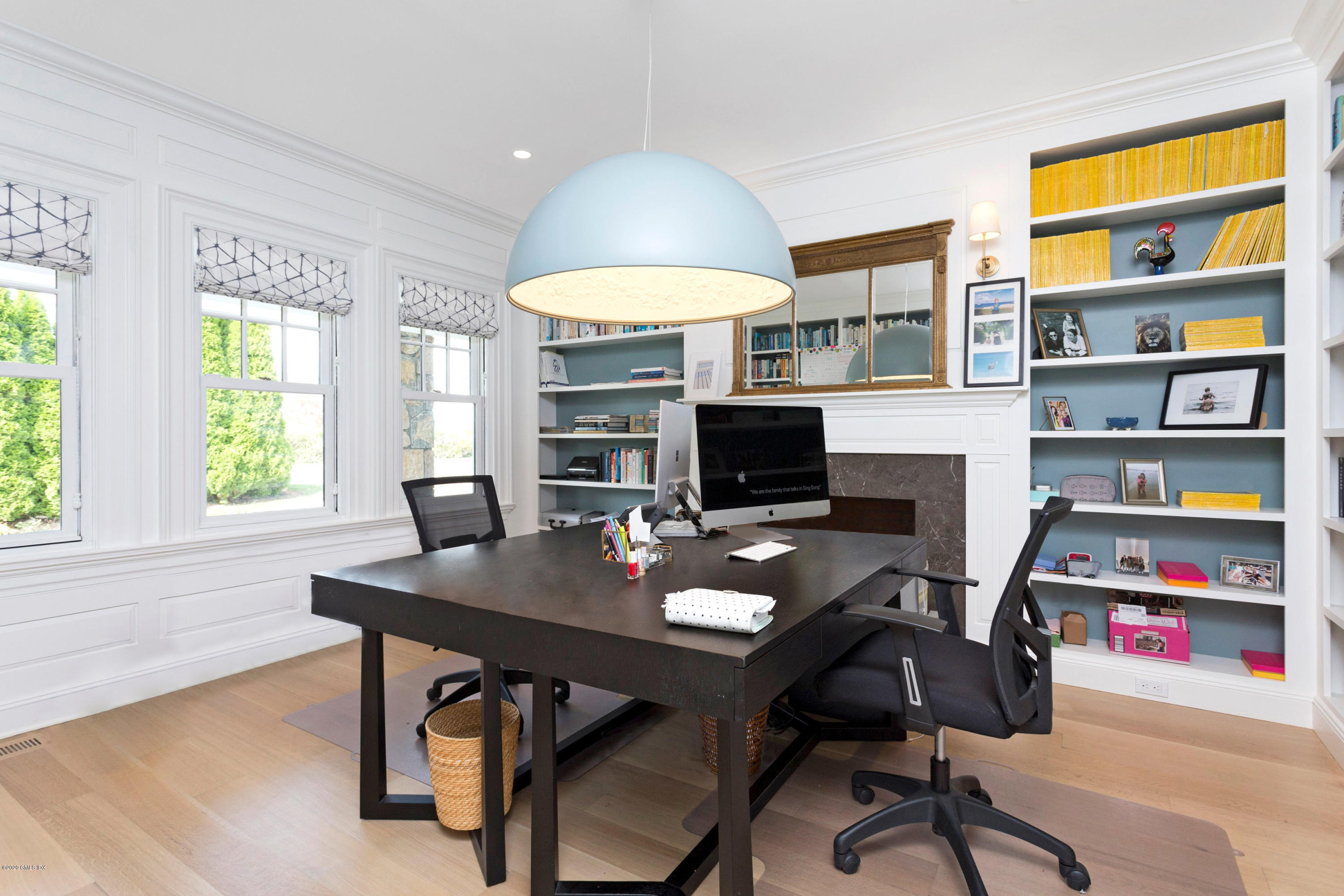186 Shore Road Old Greenwich, CT 06870 - Photo 16 of 37 a view of a workspace with furniture and a potted plant