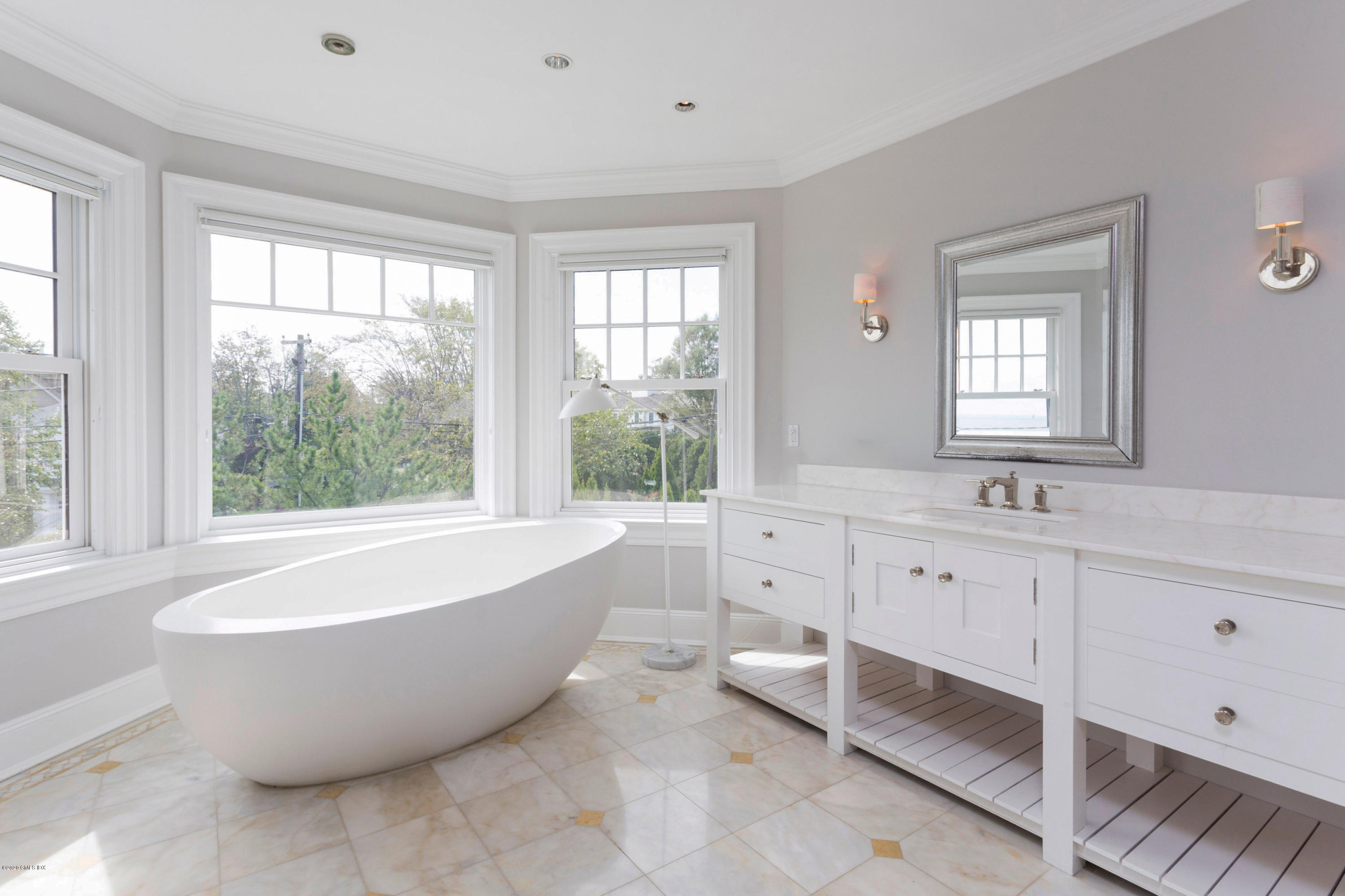 186 Shore Road Old Greenwich, CT 06870 - Photo 21 of 37 a large tub sitting next to a window