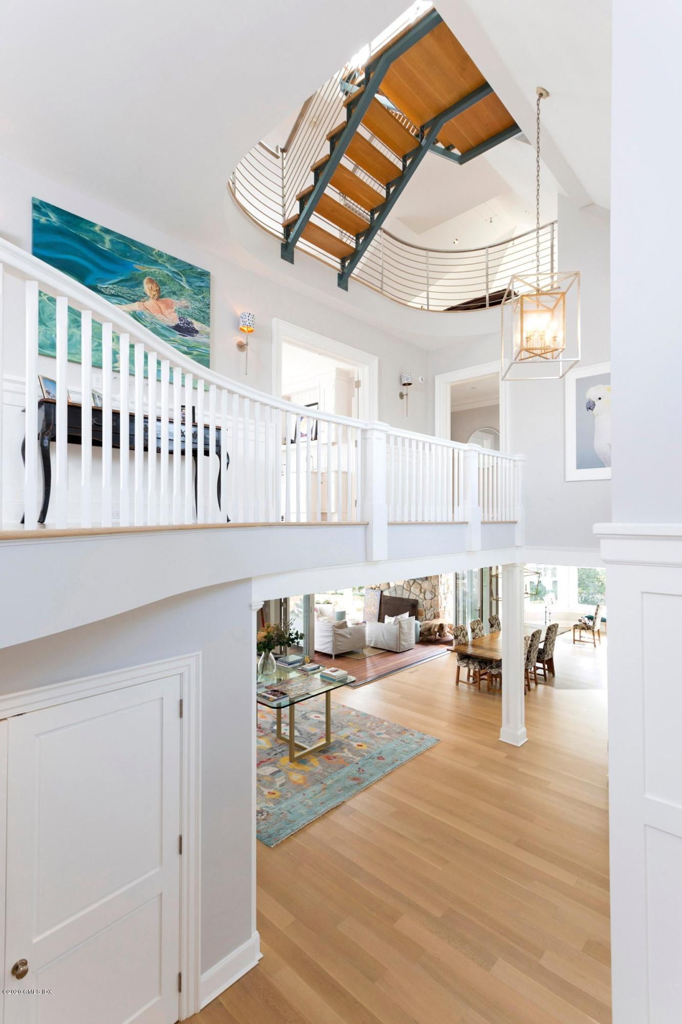 186 Shore Road Old Greenwich, CT 06870 - Photo 9 of 37 a view of a living room and kitchen