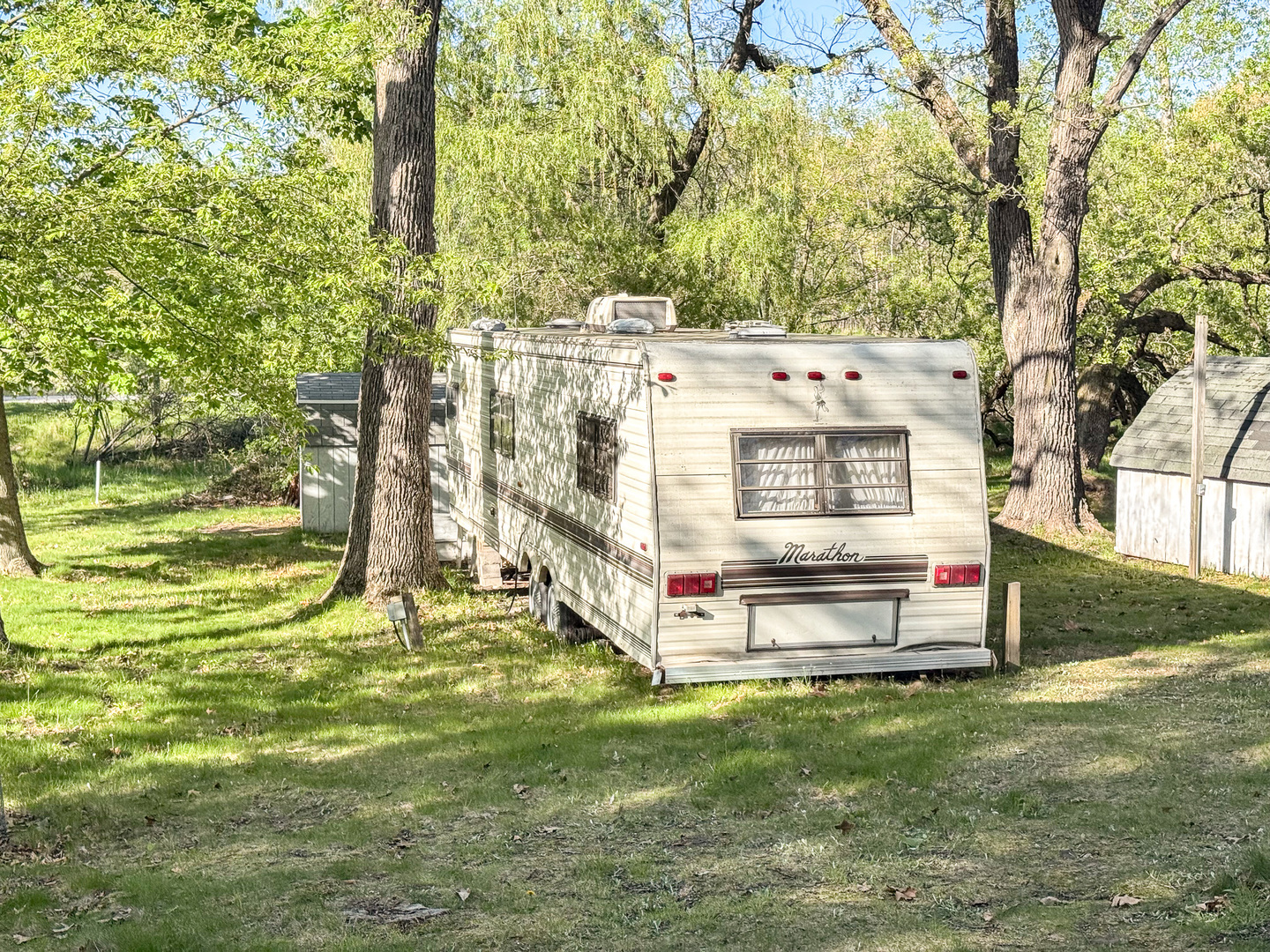 5-493 Woodhaven Sublette, IL 61367 - Photo 3 of 13 a view of a house with a yard