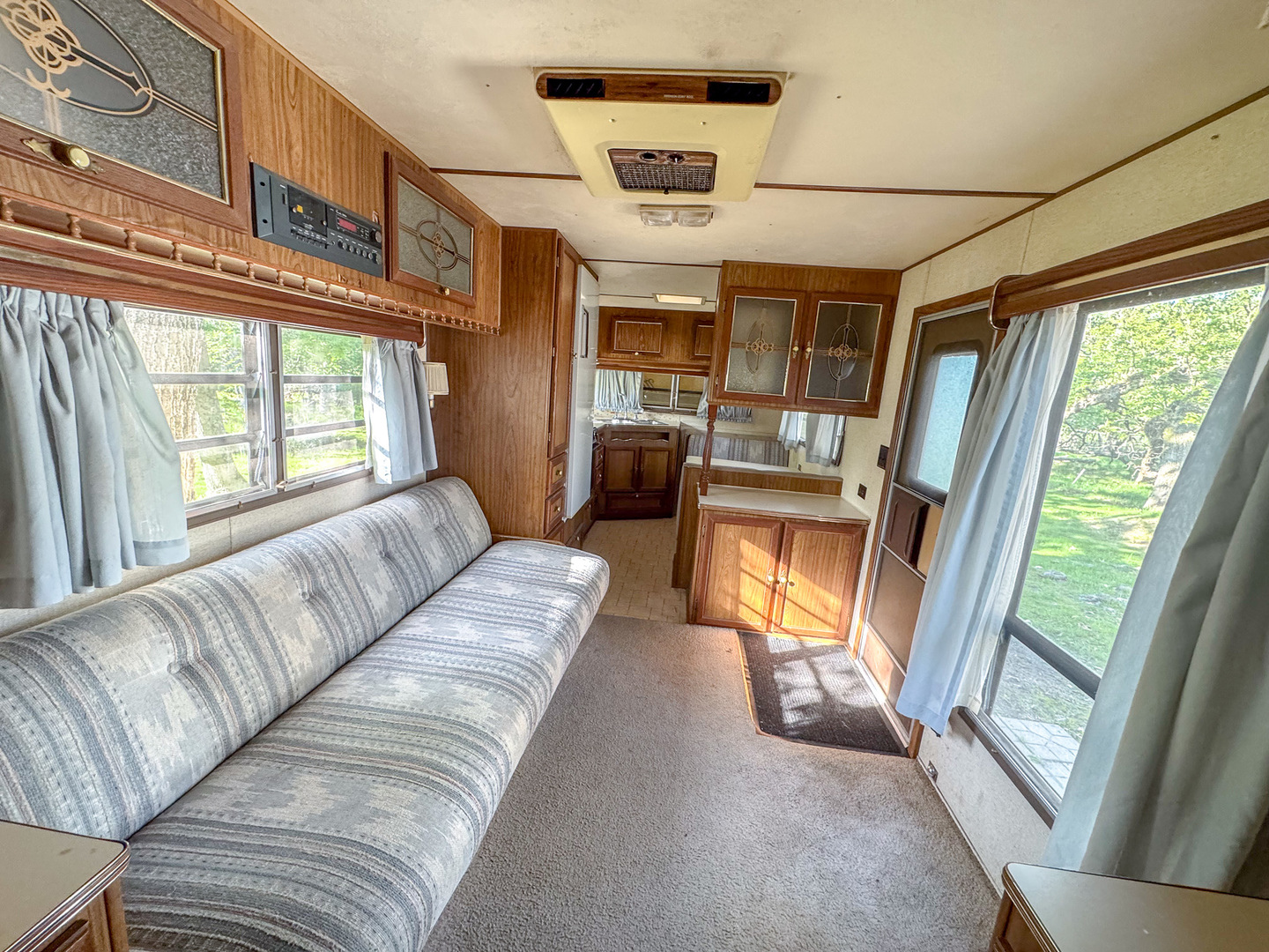 5-493 Woodhaven Sublette, IL 61367 - Photo 4 of 13 a living room with furniture and a large window