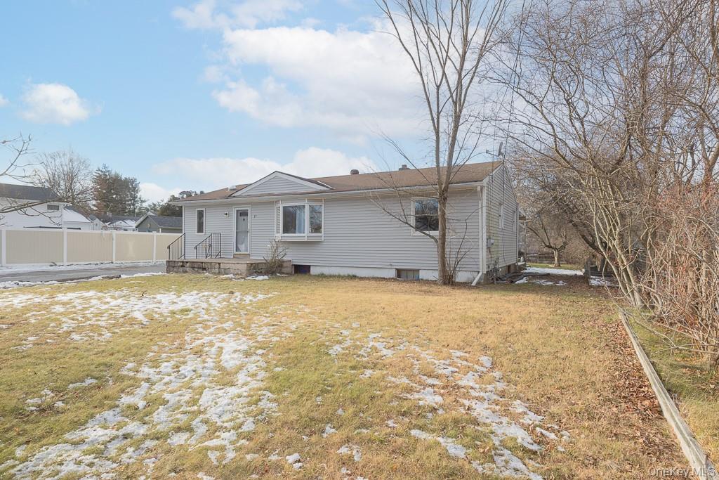 19 James Road Monroe, NY 10950 - Photo 1 of 22 a view of a house with a yard covered with snow in the yard