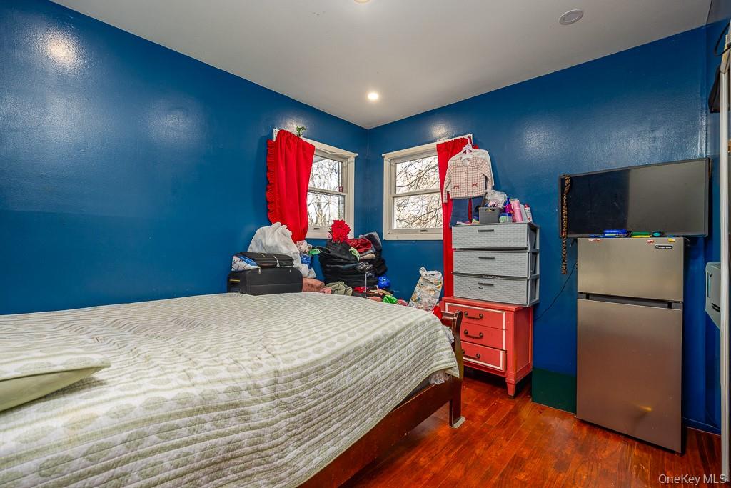 19 James Road Monroe, NY 10950 - Photo 12 of 22 a bedroom with a bed and a flat screen tv