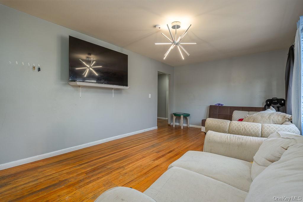 19 James Road Monroe, NY 10950 - Photo 14 of 22 a living room with furniture and a ceiling fan