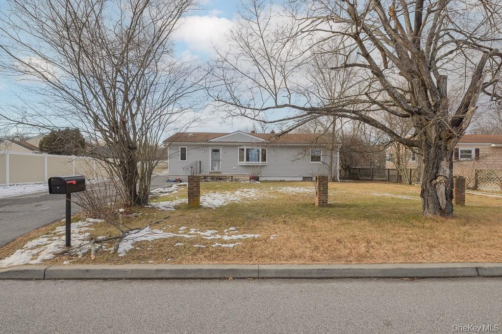 19 James Road Monroe, NY 10950 - Photo 2 of 22 a view of a yard with snow on the road