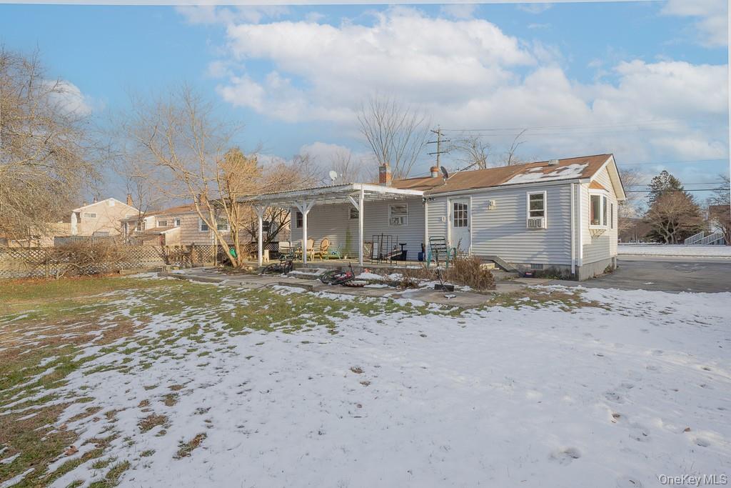 19 James Road Monroe, NY 10950 - Photo 4 of 22 a front view of a house with a yard