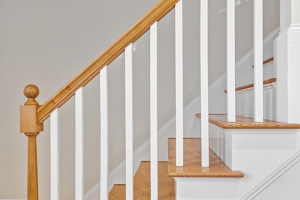 29 Central Street, Unit 2 Manchester, MA 01944 - Photo 12 of 22 a view of staircase with white walls and a window