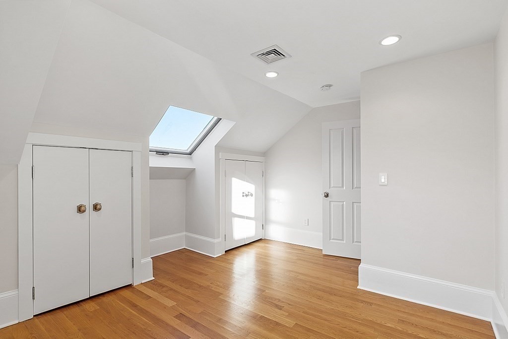 29 Central Street, Unit 2 Manchester, MA 01944 - Photo 13 of 22 wooden floor in an empty room with a window