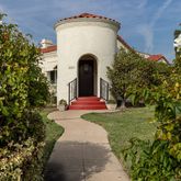 a view of a garden with a porch