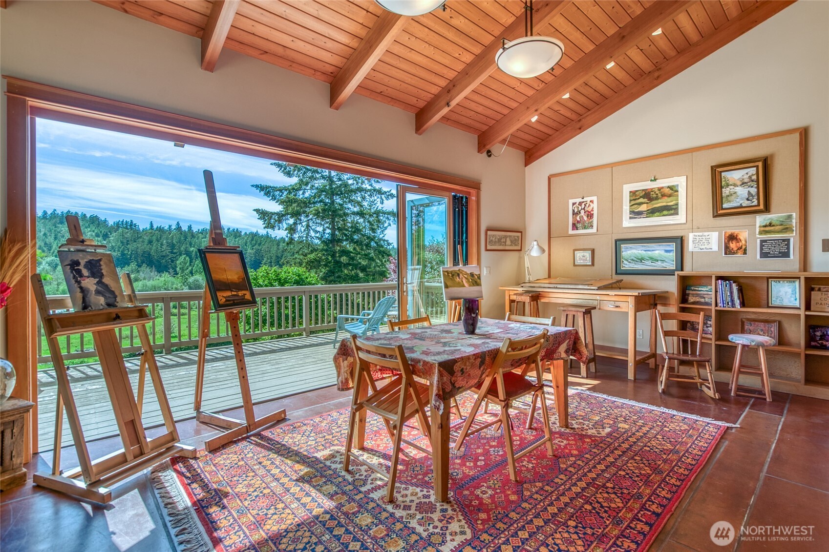 402 Cayou Valley Road Orcas Island, WA 98245 - Photo 31 of 40 a view of a dining room with furniture window and wooden floor