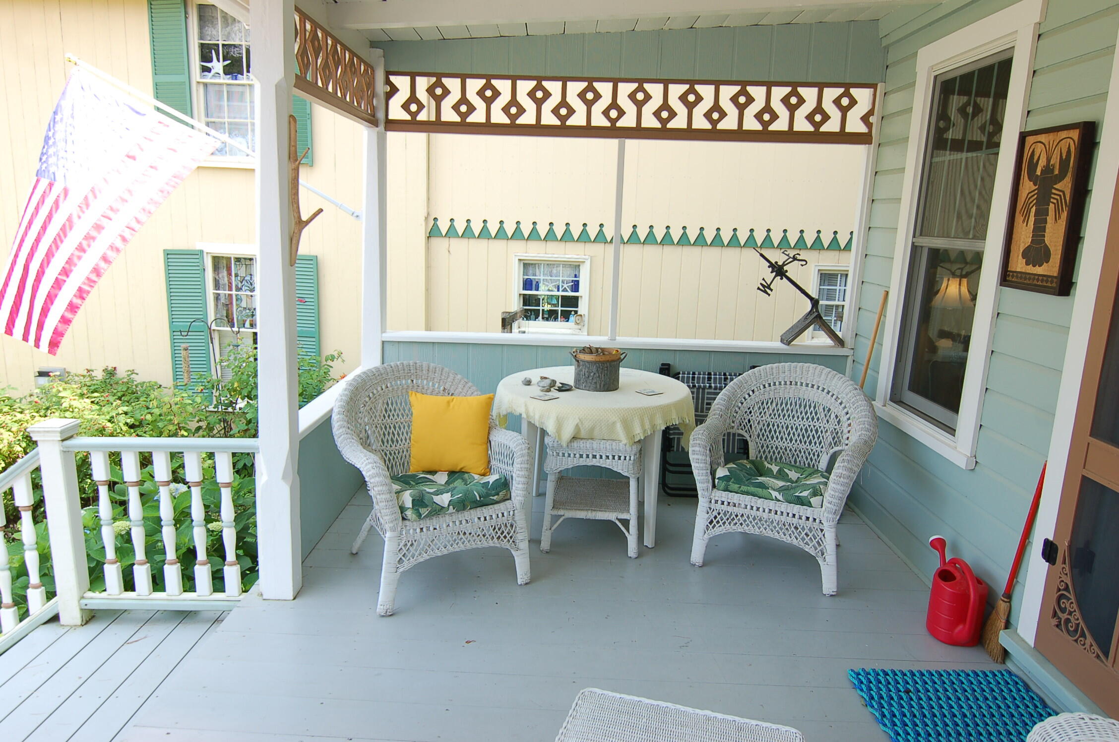 33 Broadway Northport, ME 04849 - Photo 4 of 27 Front Porch Seating Area with Views galo