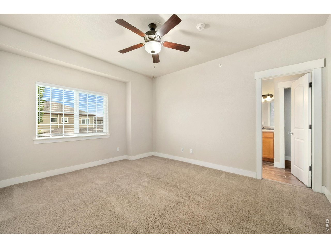 3902 Precision Drive, Unit D Fort Collins, CO 80528 - Photo 15 of 25 Primary Suite