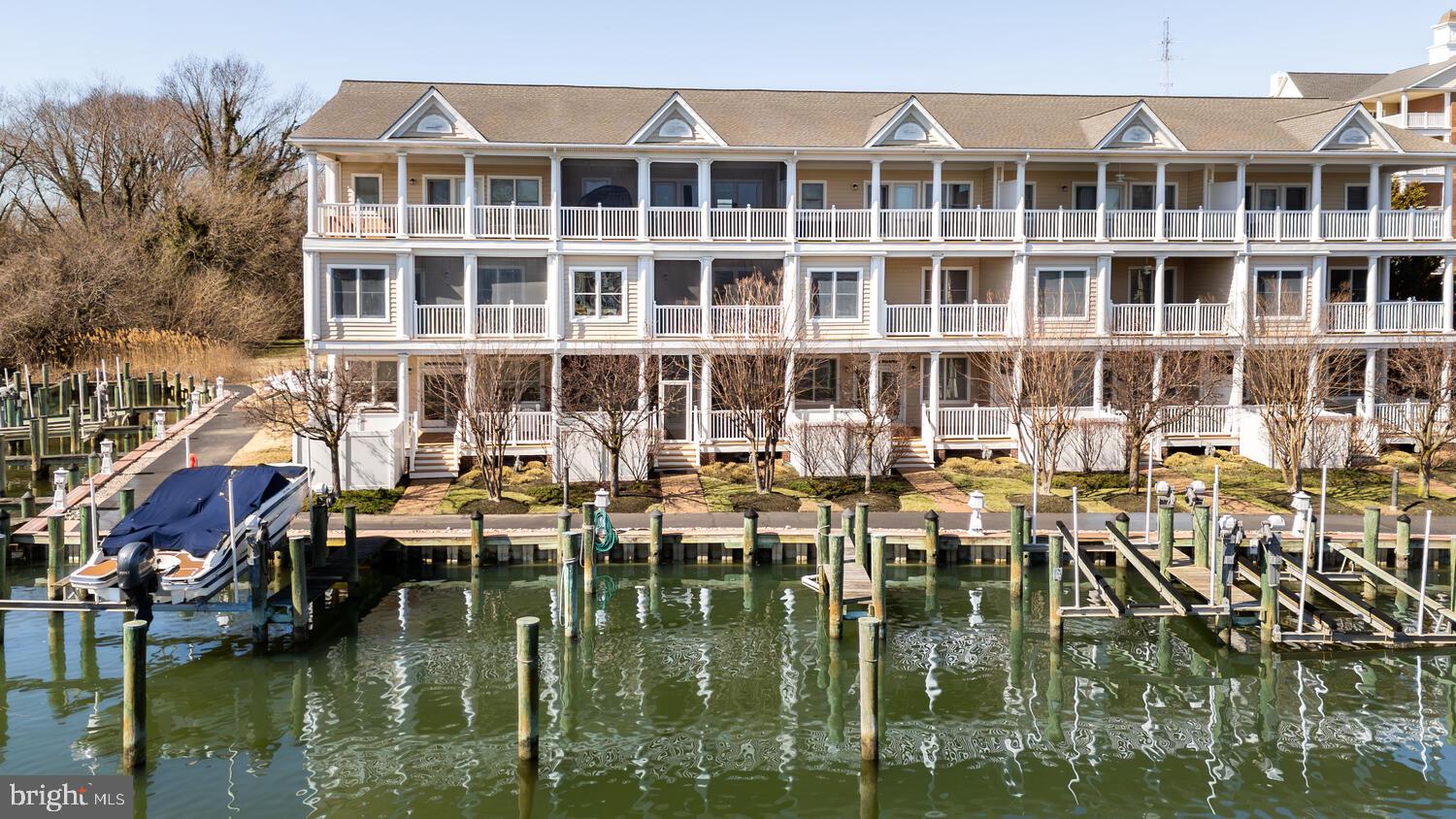 a boat is parked in front of a house