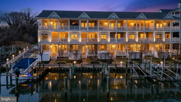 a boat is sitting in front of a building