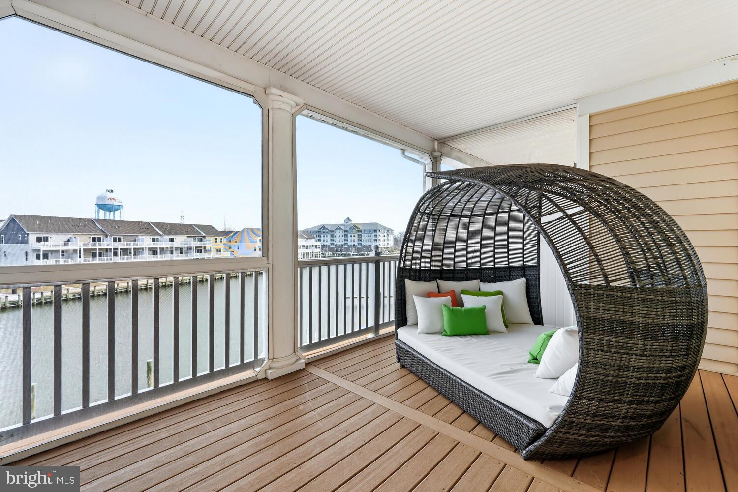 202 Muir Street, Unit 202 Cambridge, MD 21613 - Photo 27 of 54 a view of balcony with wooden floor