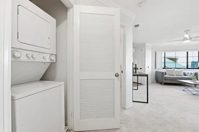 a view of bathroom and utility room
