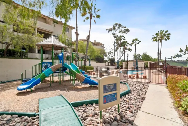 a view of a sign under a tree