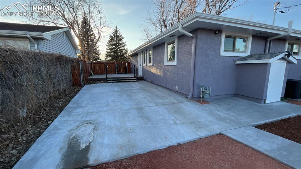 1219 Prairie Road Colorado Springs, CO 80909 - Photo 4 of 16 a view of backyard of house