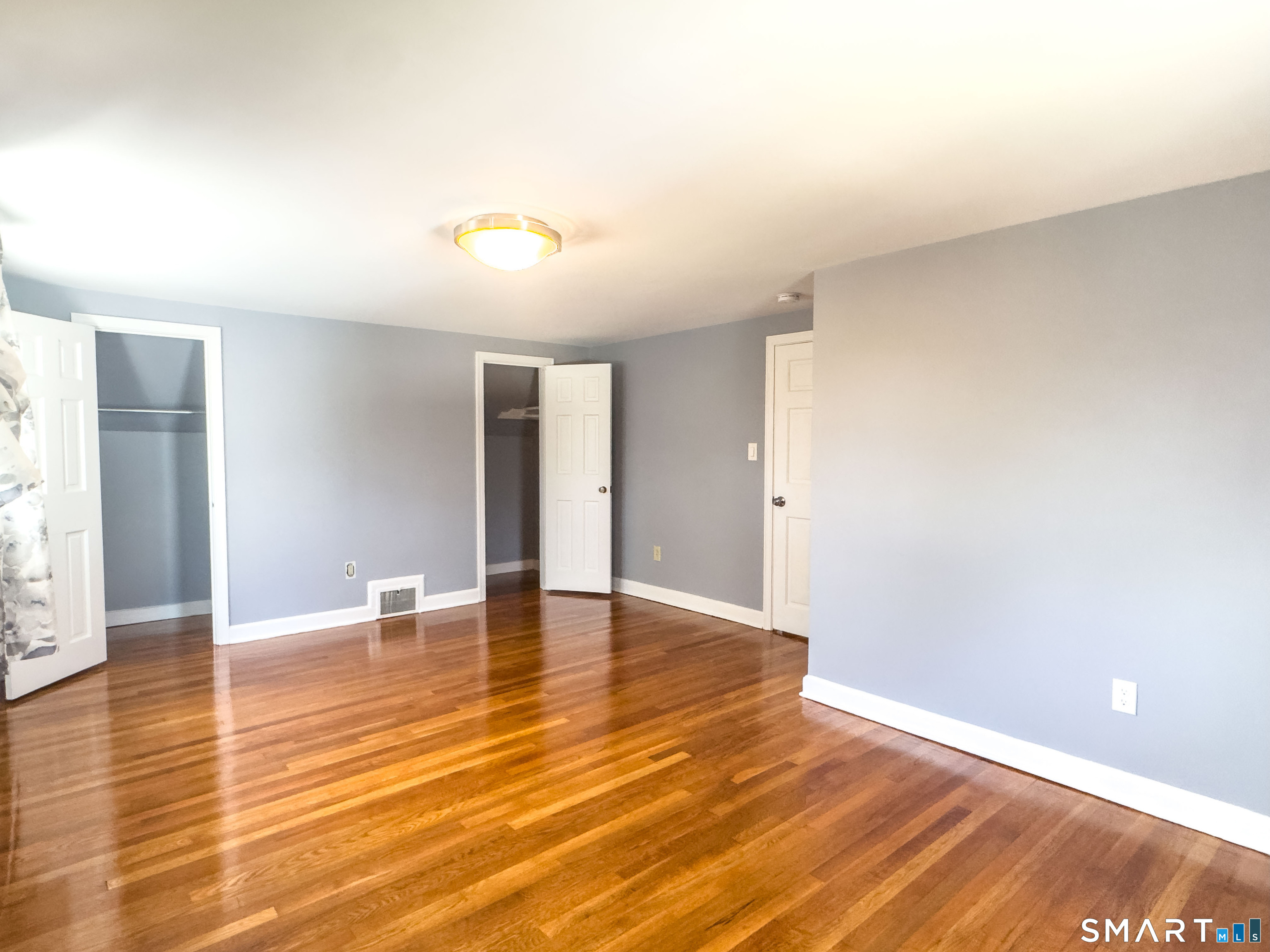 27 Glendale Drive Waterbury, CT 06708 - Photo 18 of 27 a view of an empty room with wooden floor