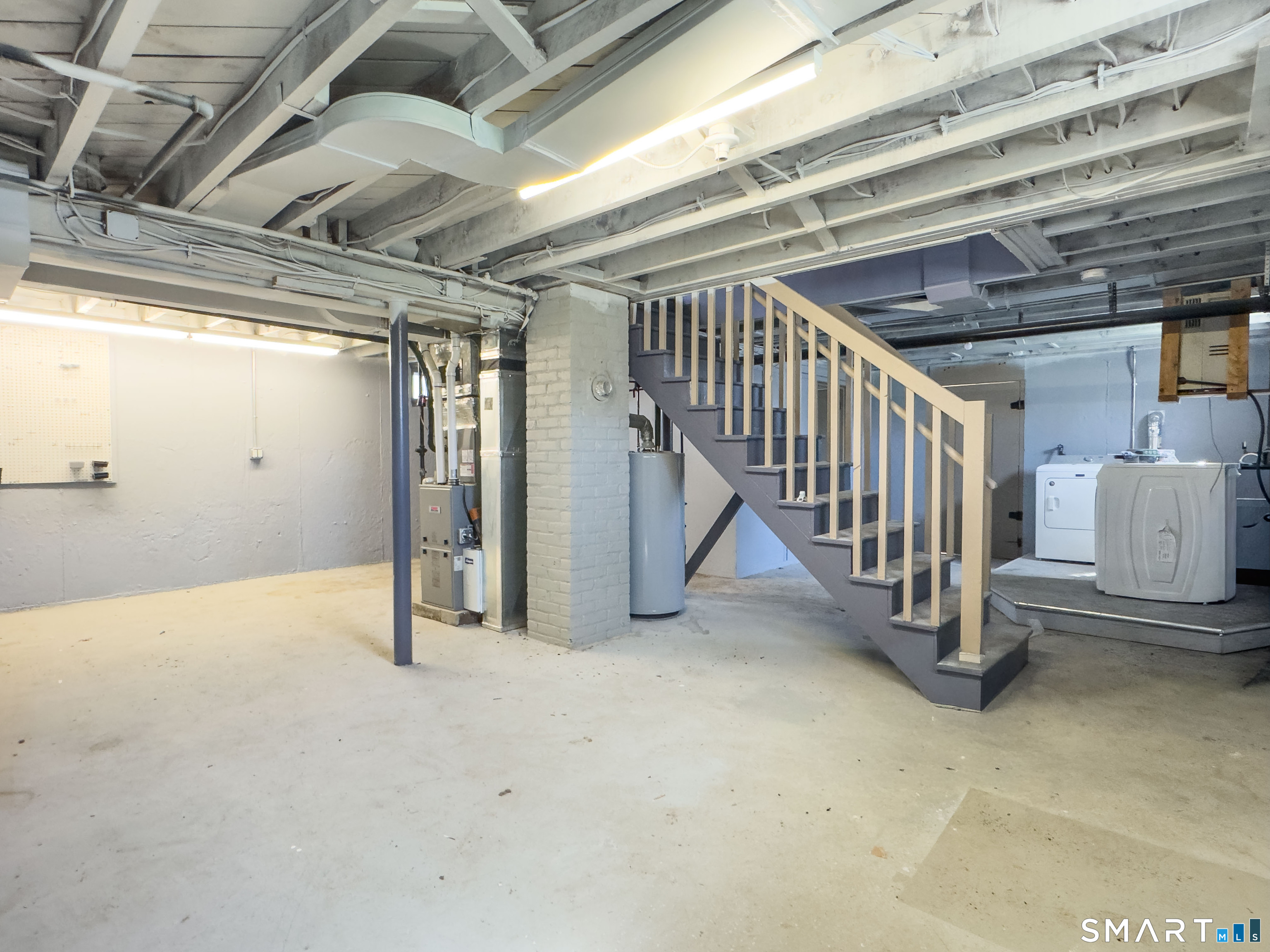 27 Glendale Drive Waterbury, CT 06708 - Photo 19 of 27 a view of an empty room with stairs