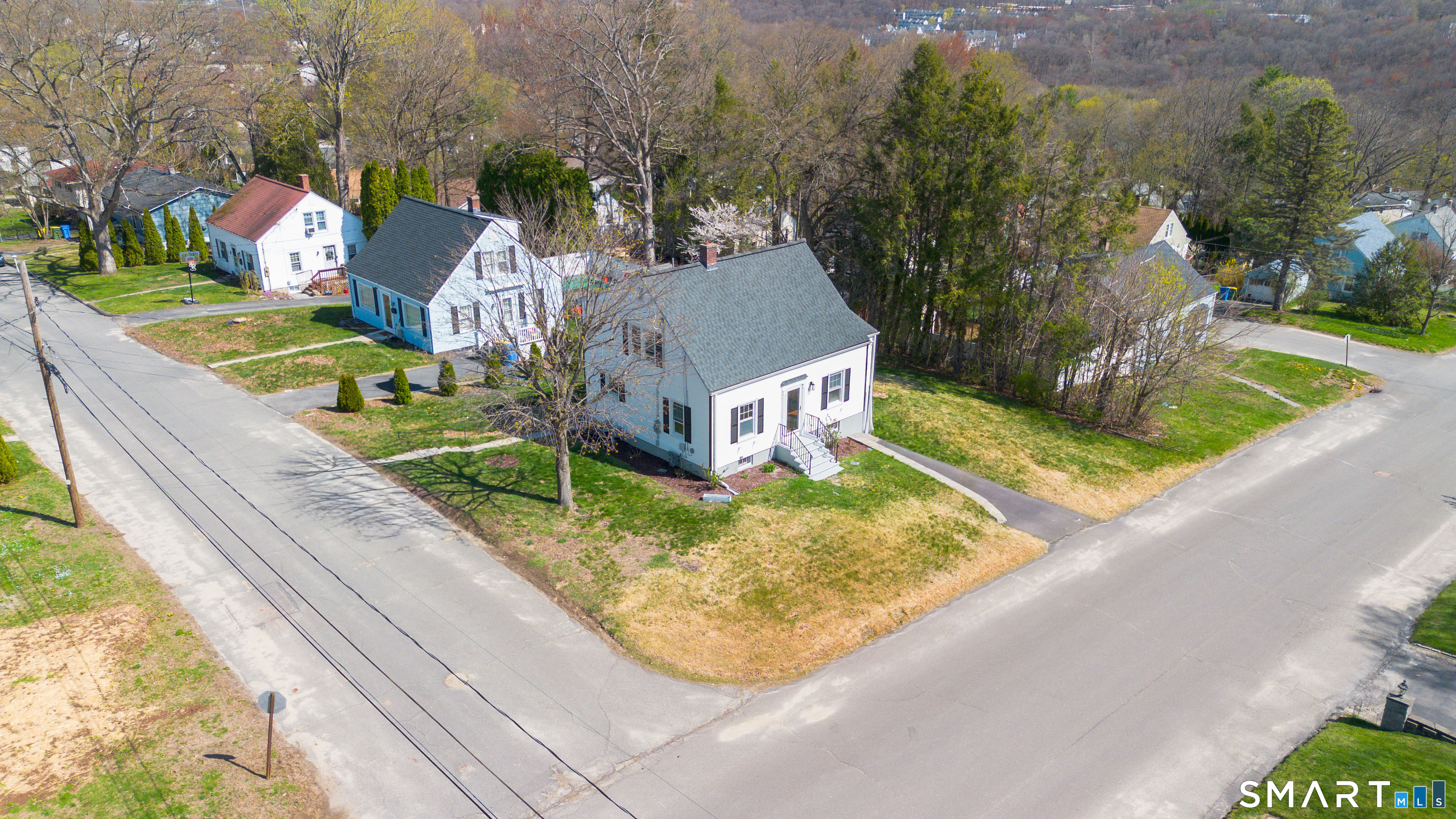 27 Glendale Drive Waterbury, CT 06708 - Photo 2 of 27 a view of a house with a yard and sitting area
