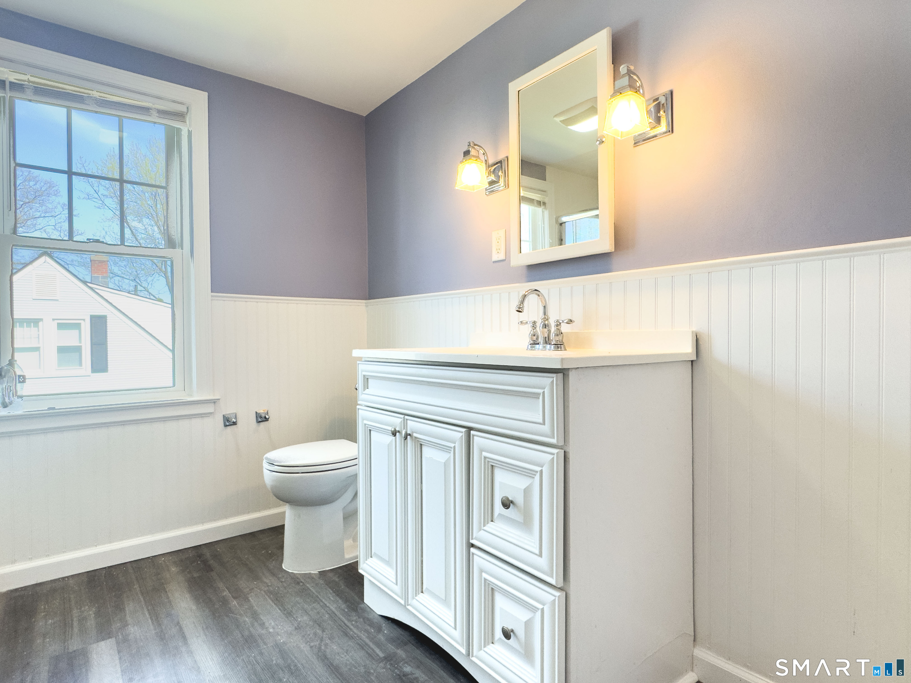 27 Glendale Drive Waterbury, CT 06708 - Photo 8 of 27 a bathroom with a sink vanity and a mirror