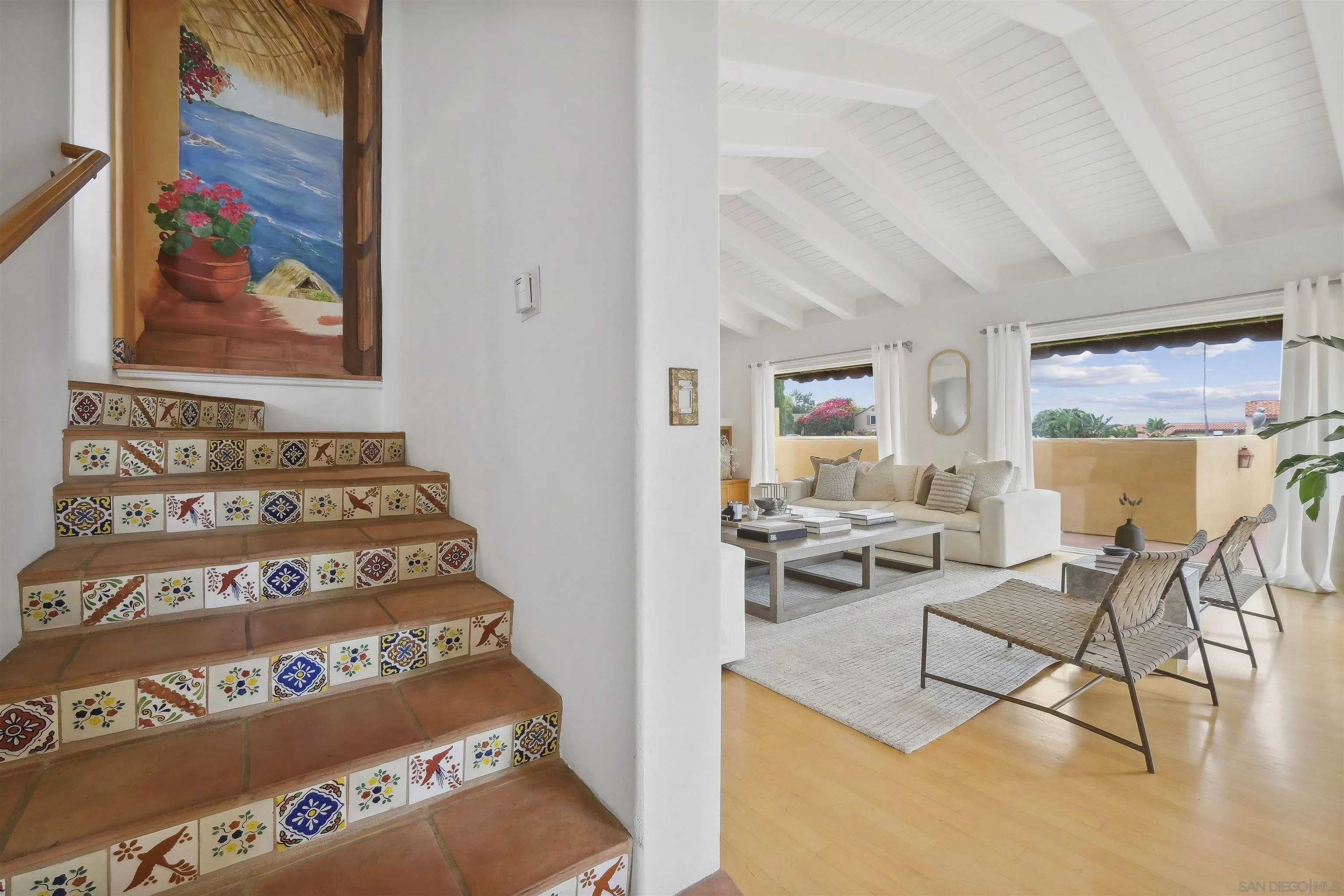 1937 Paseo Dorado La Jolla, CA 92037 - Photo 13 of 53 a view of a hallway with couch and dining area