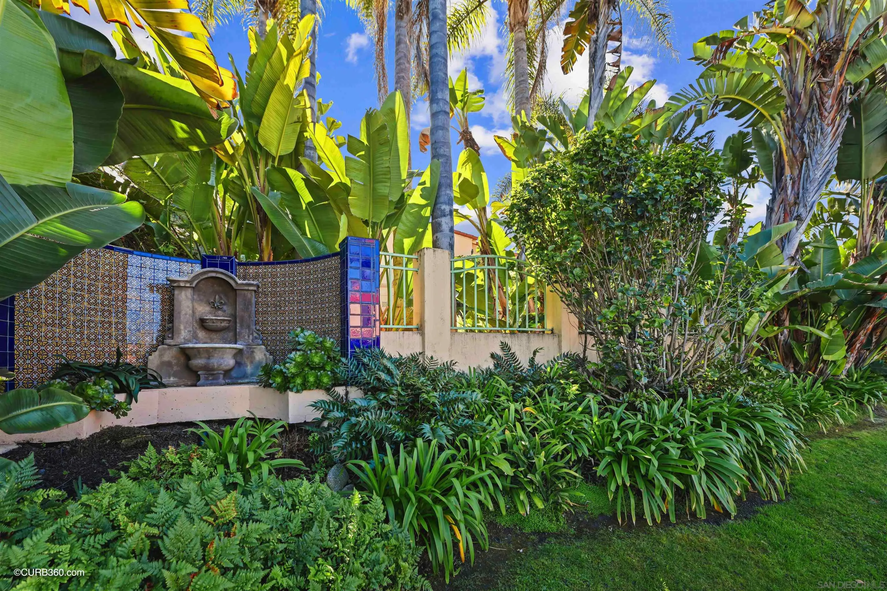 1937 Paseo Dorado La Jolla, CA 92037 - Photo 34 of 53 a backyard of a house with lots of green space