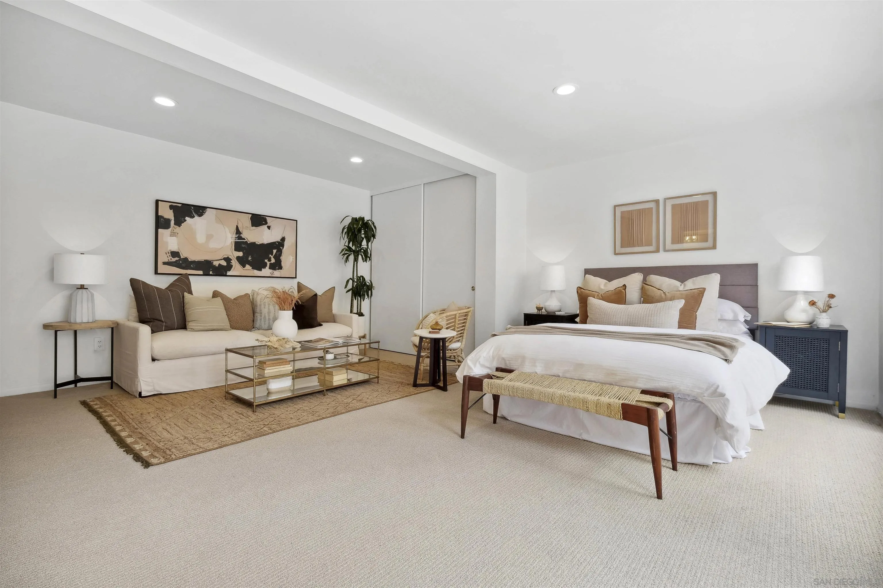 1937 Paseo Dorado La Jolla, CA 92037 - Photo 40 of 53 a bedroom with a bed and couch