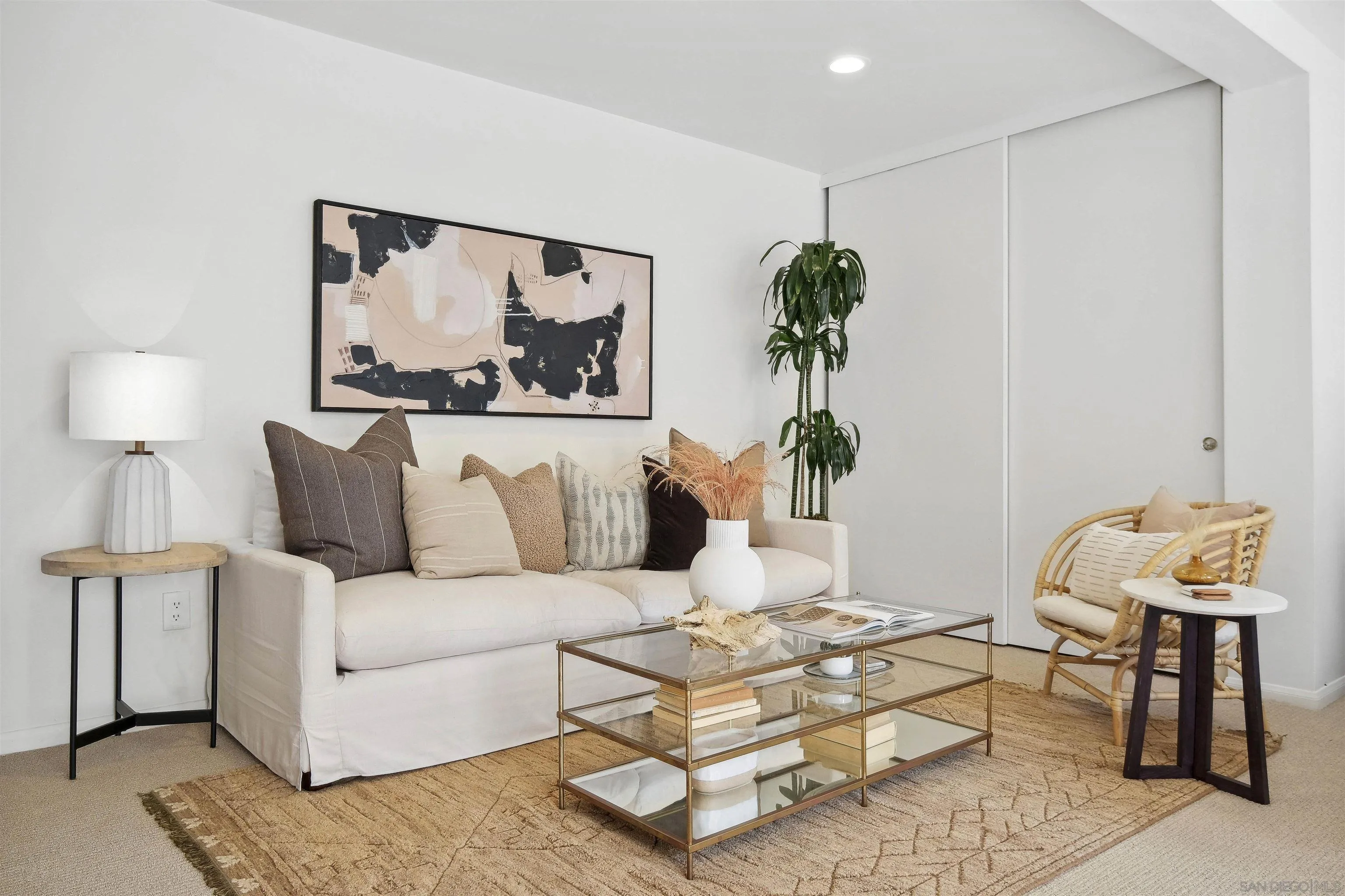 1937 Paseo Dorado La Jolla, CA 92037 - Photo 41 of 53 a living room with furniture and a painting on the wall