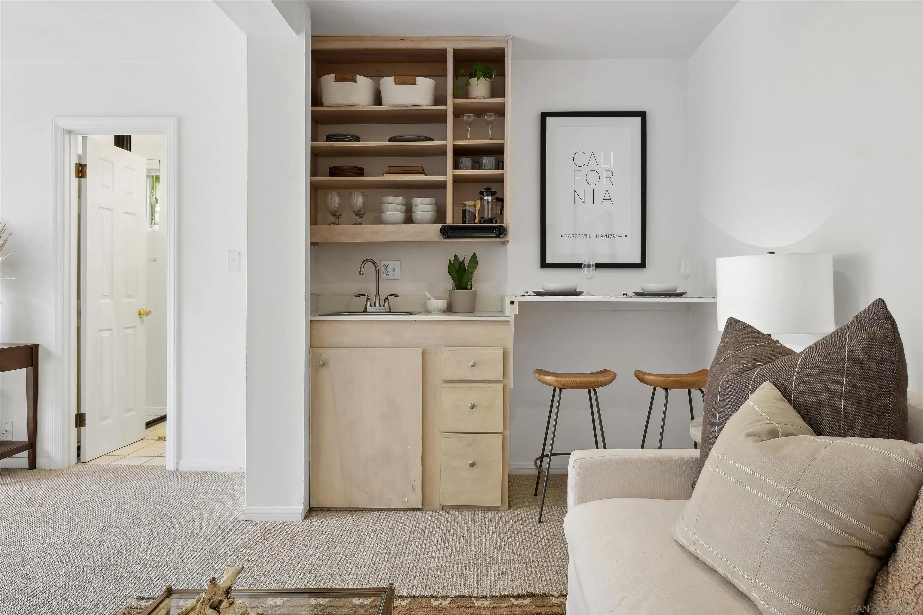 1937 Paseo Dorado La Jolla, CA 92037 - Photo 42 of 53 a living room with furniture a lamp and entryway