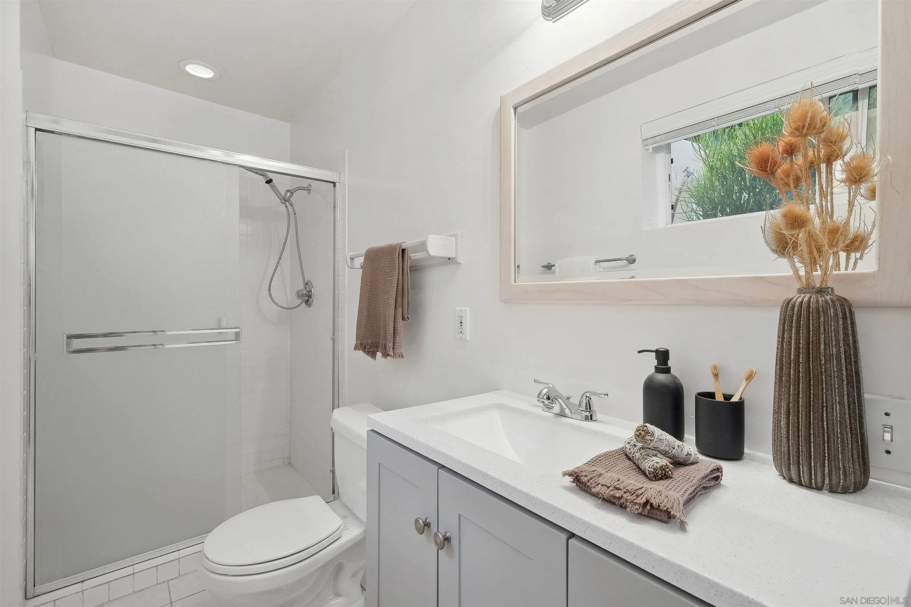 1937 Paseo Dorado La Jolla, CA 92037 - Photo 43 of 53 a bathroom with a granite countertop sink toilet and shower