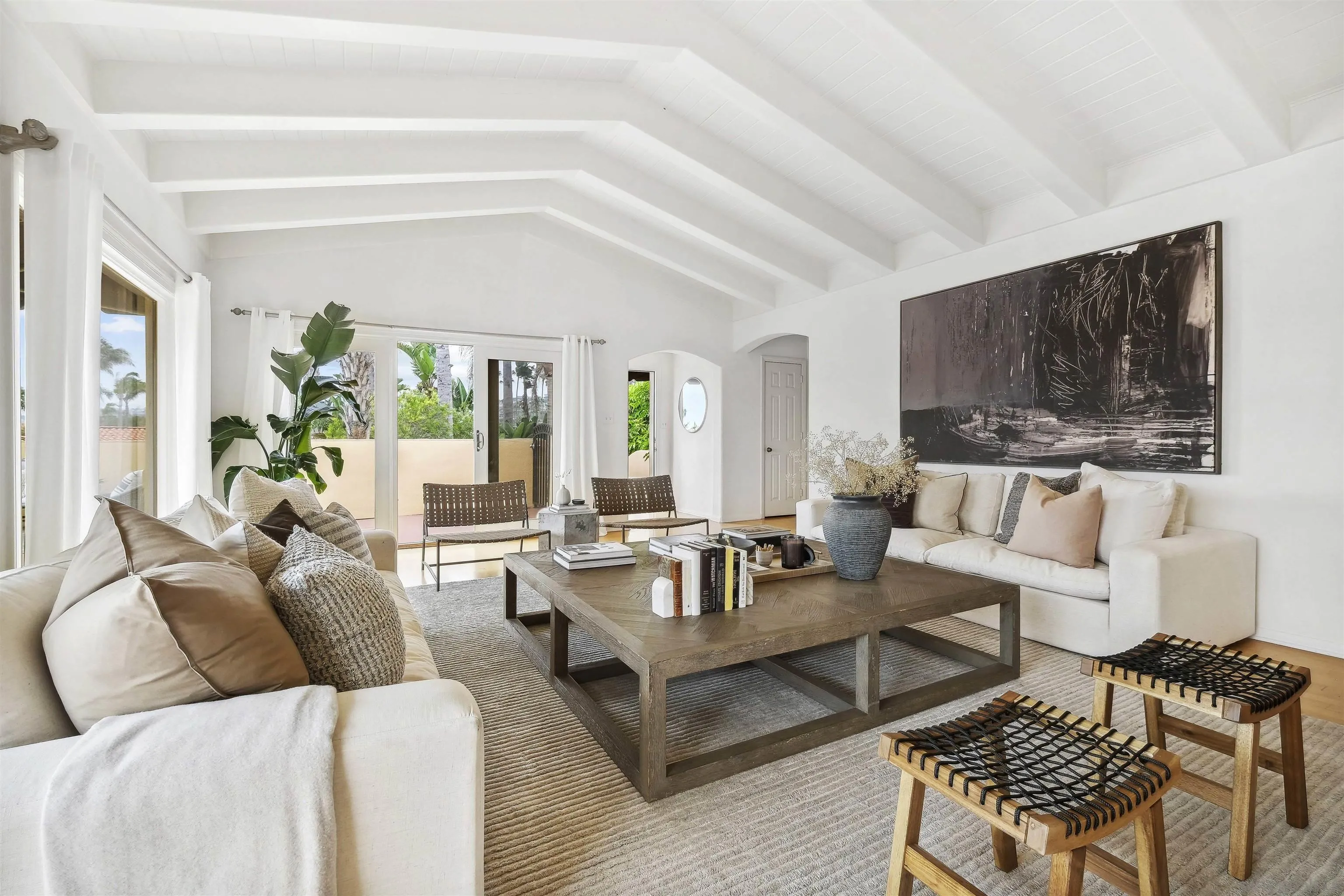 1937 Paseo Dorado La Jolla, CA 92037 - Photo 8 of 53 a living room with furniture and a flat screen tv
