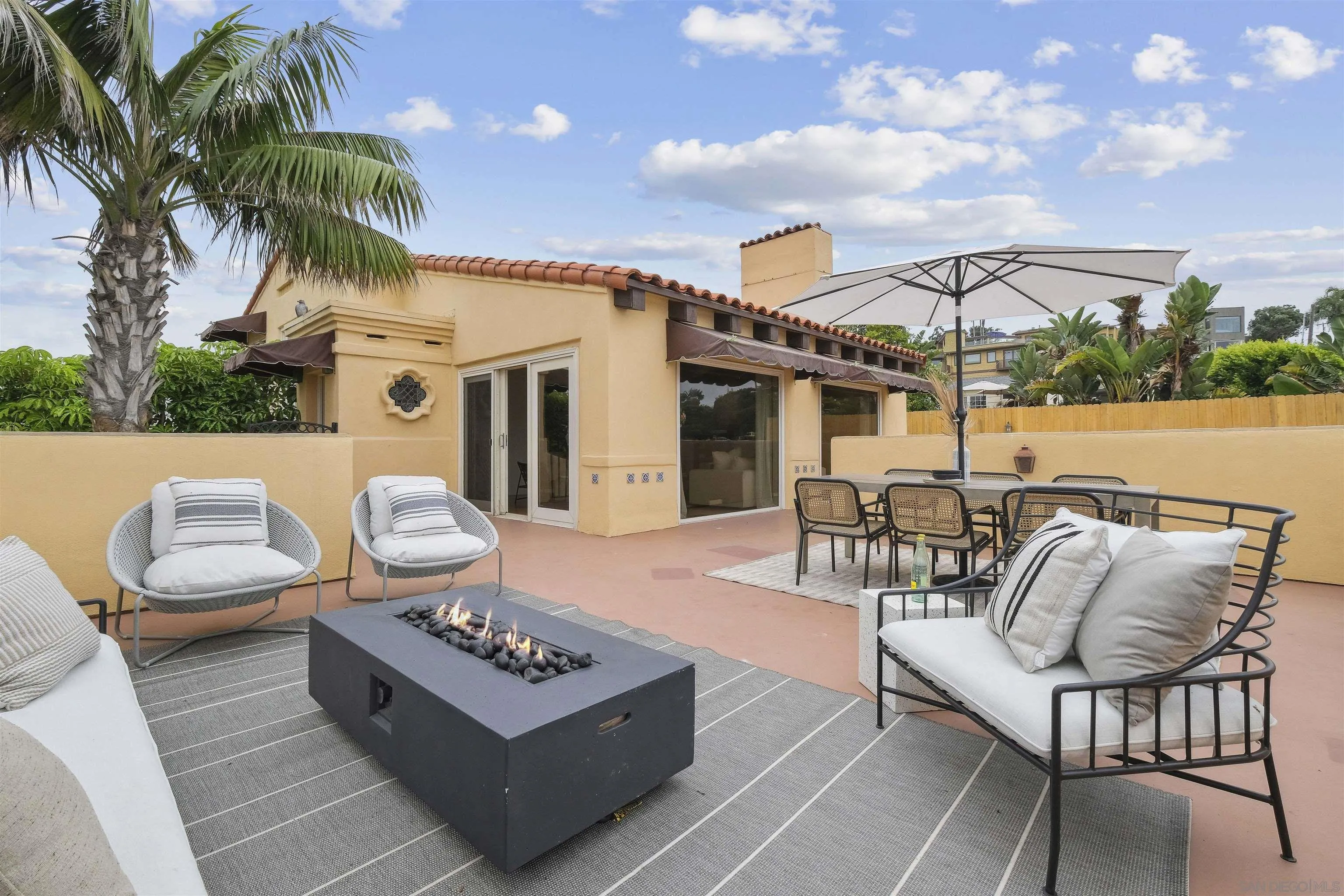 1937 Paseo Dorado La Jolla, CA 92037 - Photo 10 of 53 a view of a patio with couches and a potted plant on a table